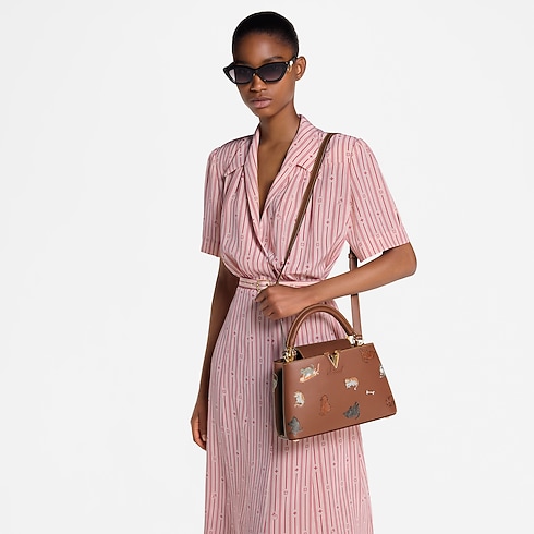 กระเป๋ารุ่น Capucines BB Capucines in ผู้หญิง's กระเป๋าถือ กระเป๋ารุ่น Capucines collections by Louis Vuitton (การย่อ/ขยายผลิตภัณฑ์)