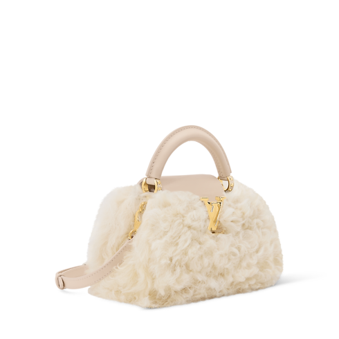 กระเป๋ารุ่น Capucines Mini Snowball Capucines in ผู้หญิง's กระเป๋าถือ กระเป๋าถือสำหรับผู้หญิง collections by Louis Vuitton (การย่อ/ขยายผลิตภัณฑ์)