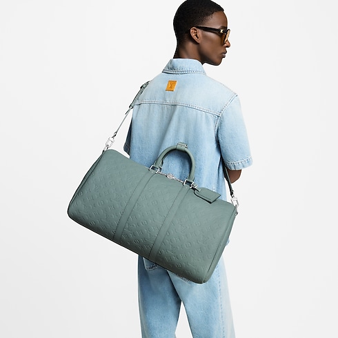 กระเป๋ารุ่น Keepall Bandoulière 50 Taurillon Monogram in กระเป๋าและผลิตภัณฑ์เครื่องหนังขนาดเล็ก's สำหรับผู้ชาย ผลิตภัณฑ์ใหม่ล่าสุด collections by Louis Vuitton (การย่อ/ขยายผลิตภัณฑ์)