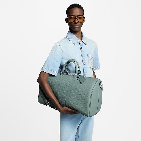 กระเป๋ารุ่น Keepall Bandoulière 50 Taurillon Monogram in กระเป๋าและผลิตภัณฑ์เครื่องหนังขนาดเล็ก's สำหรับผู้ชาย ผลิตภัณฑ์ใหม่ล่าสุด collections by Louis Vuitton (การย่อ/ขยายผลิตภัณฑ์)