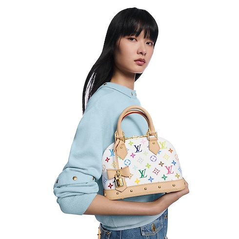LV x TM - กระเป๋ารุ่น Alma BB Monogram แคนวาสประเภทอื่น in กระเป๋าและผลิตภัณฑ์เครื่องหนังขนาดเล็ก's สำหรับผู้หญิง ไอคอนิก collections by Louis Vuitton (การย่อ/ขยายผลิตภัณฑ์)