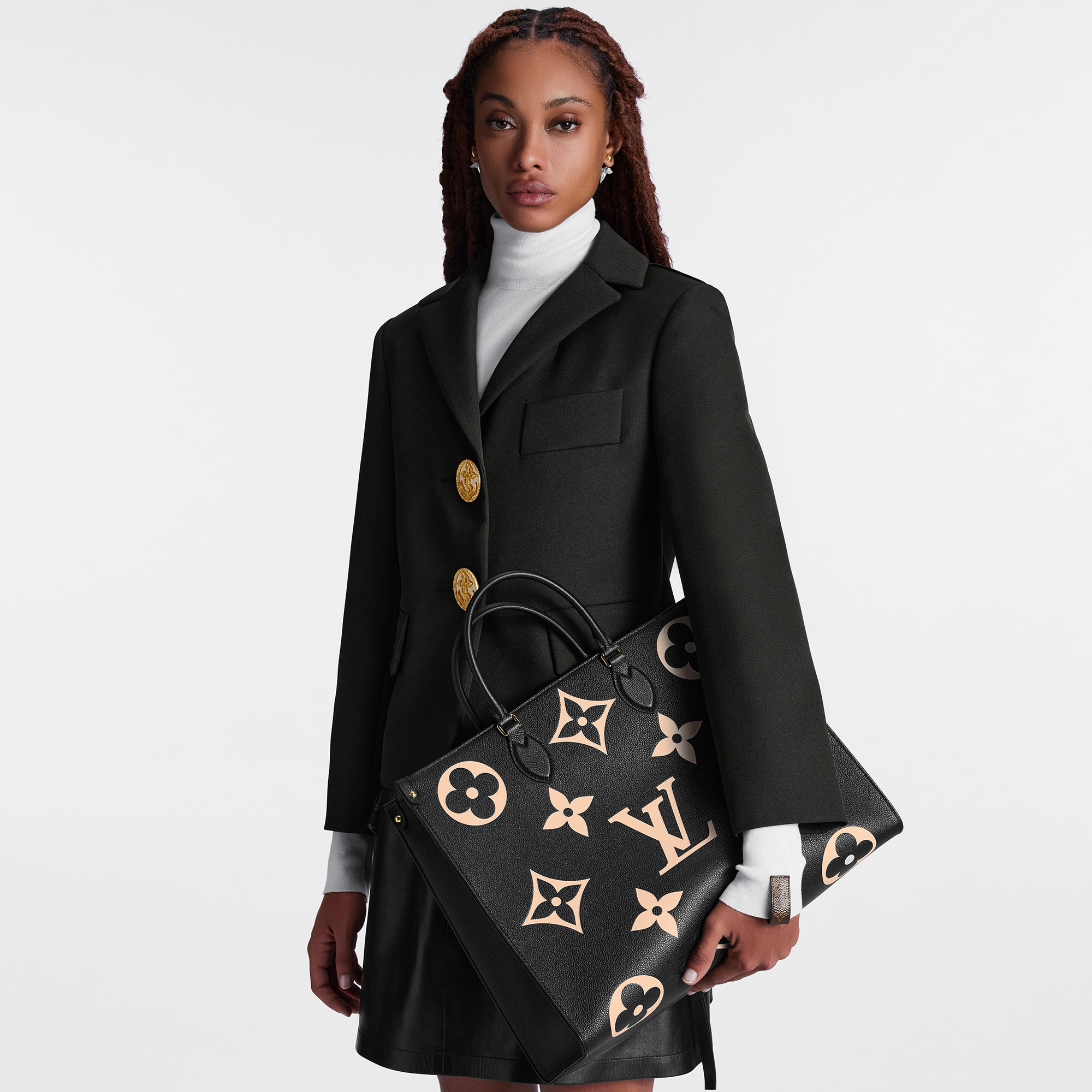 กระเป๋ารุ่น OnTheGo GM Bicolor Monogram Empreinte in ผู้หญิง