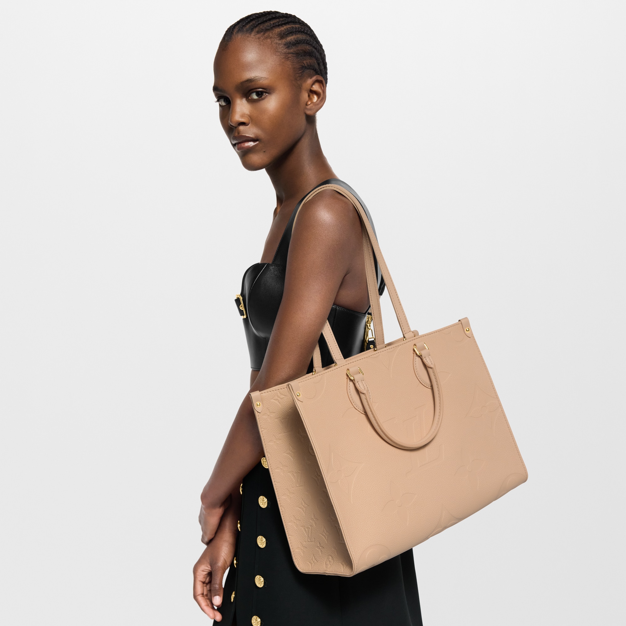 กระเป๋ารุ่น OnTheGo MM Monogram Empreinte in ผู้หญิง