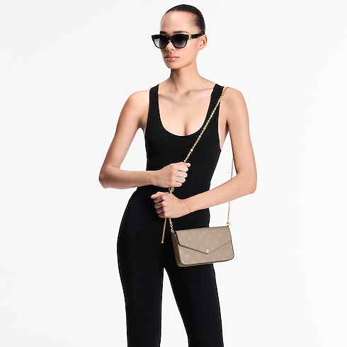 กระเป๋ารุ่น Félicie Pochette Monogram Empreinte in ผู้หญิง's กระเป๋าสตางค์และผลิตภัณฑ์เครื่องหนังขนาดเล็ก กระเป๋าสตางค์สะพายข้างสำหรับผู้หญิง collections by Louis Vuitton (การย่อ/ขยายผลิตภัณฑ์)