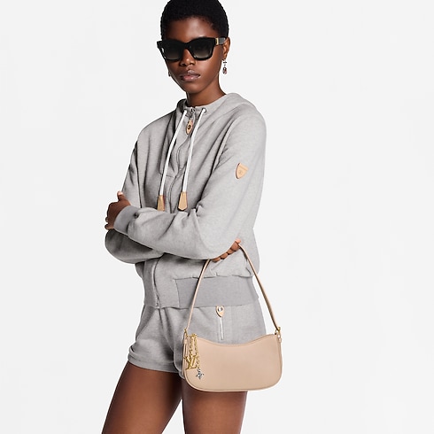 กระเป๋ารุ่น Pochette LV Bloom H36 in ผู้หญิง's กระเป๋าสตางค์และผลิตภัณฑ์เครื่องหนังขนาดเล็ก กระเป๋าสตางค์สะพายข้างสำหรับผู้หญิง collections by Louis Vuitton (การย่อ/ขยายผลิตภัณฑ์)