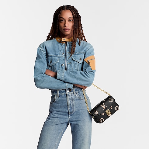 กระเป๋ารุ่น Pochette Métis East West Monogram Empreinte in ผู้หญิง's กระเป๋าถือ คอลเล็คชั่นทั้งหมด collections by Louis Vuitton (การย่อ/ขยายผลิตภัณฑ์)