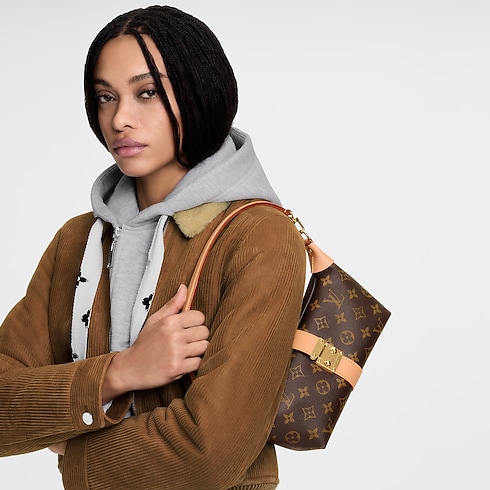 กระเป๋ารุ่น Pochette Mia Monogram in ผู้หญิง's กระเป๋าสตางค์และผลิตภัณฑ์เครื่องหนังขนาดเล็ก กระเป๋าสตางค์สะพายข้างสำหรับผู้หญิง collections by Louis Vuitton (การย่อ/ขยายผลิตภัณฑ์)