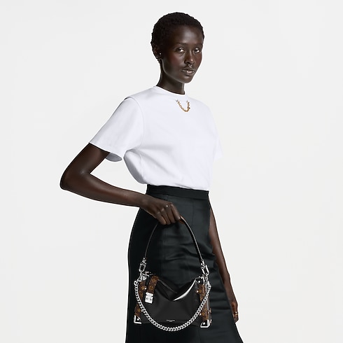 กระเป๋ารุ่น Trunk Vibe MM H34 in Bags and Small Leather Goods's Women Bags ไอคอนิก collections by Louis Vuitton (การย่อ/ขยายผลิตภัณฑ์)