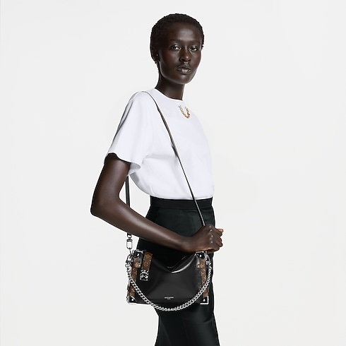 กระเป๋ารุ่น Trunk Vibe MM H34 in Bags and Small Leather Goods's Women Bags ไอคอนิก collections by Louis Vuitton (การย่อ/ขยายผลิตภัณฑ์)