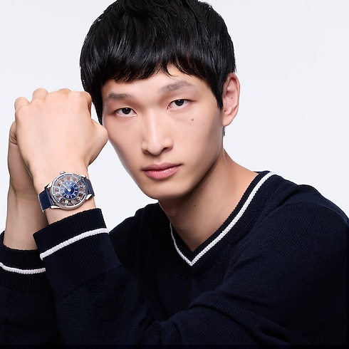 นาฬิการุ่น Tambour Spin Time Air ระบบอัตโนมัติ 42.5 มม. ไวท์โกลด์ in นาฬิกา's คอลเลกชันทั้งหมด } collections by Louis Vuitton (การย่อ/ขยายผลิตภัณฑ์)