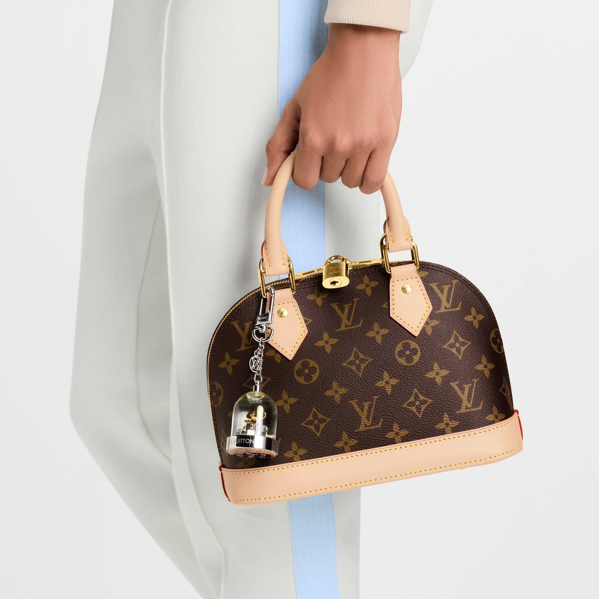 ชาร์มห้อยกระเป๋ารุ่น Vivienne Snowglobe . in ผู้หญิง