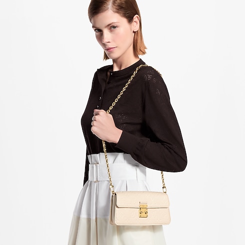 กระเป๋ารุ่น Wallet On Chain Métis Monogram Empreinte in ผู้หญิง's กระเป๋าสตางค์และผลิตภัณฑ์เครื่องหนังขนาดเล็ก กระเป๋าขนาดเล็กและกระเป๋าสตางค์สะพายข้าง collections by Louis Vuitton (การย่อ/ขยายผลิตภัณฑ์)